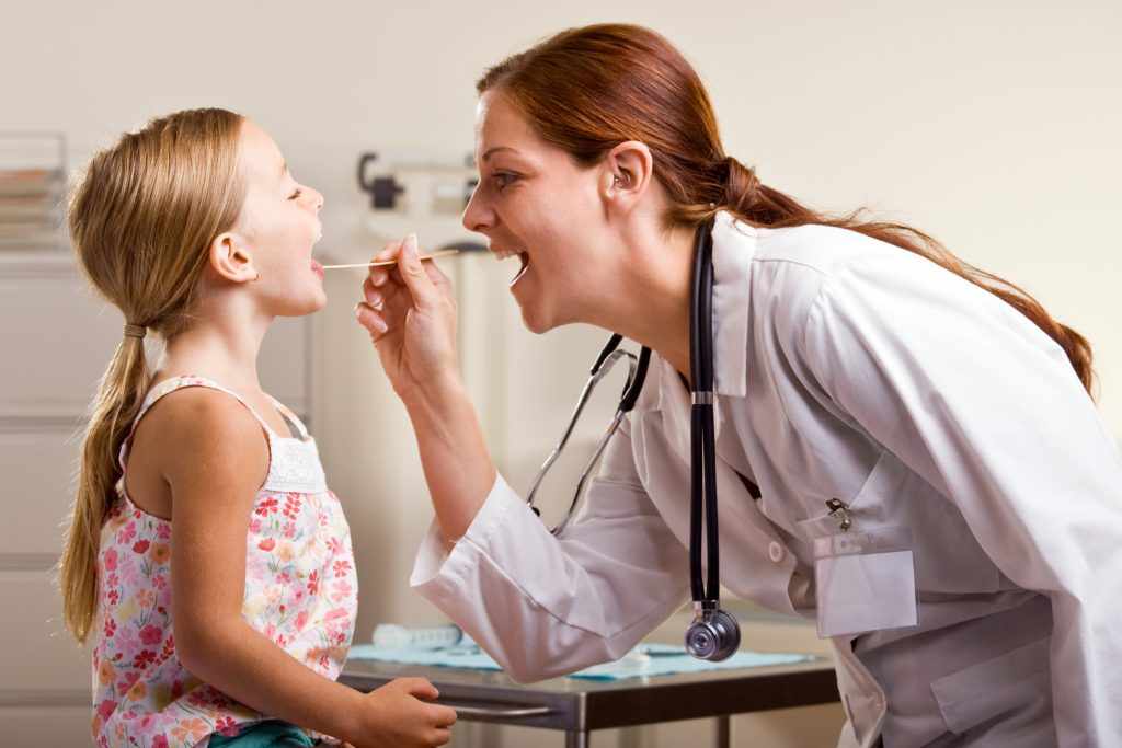 Doctor Giving Little Girl a Medical Exam